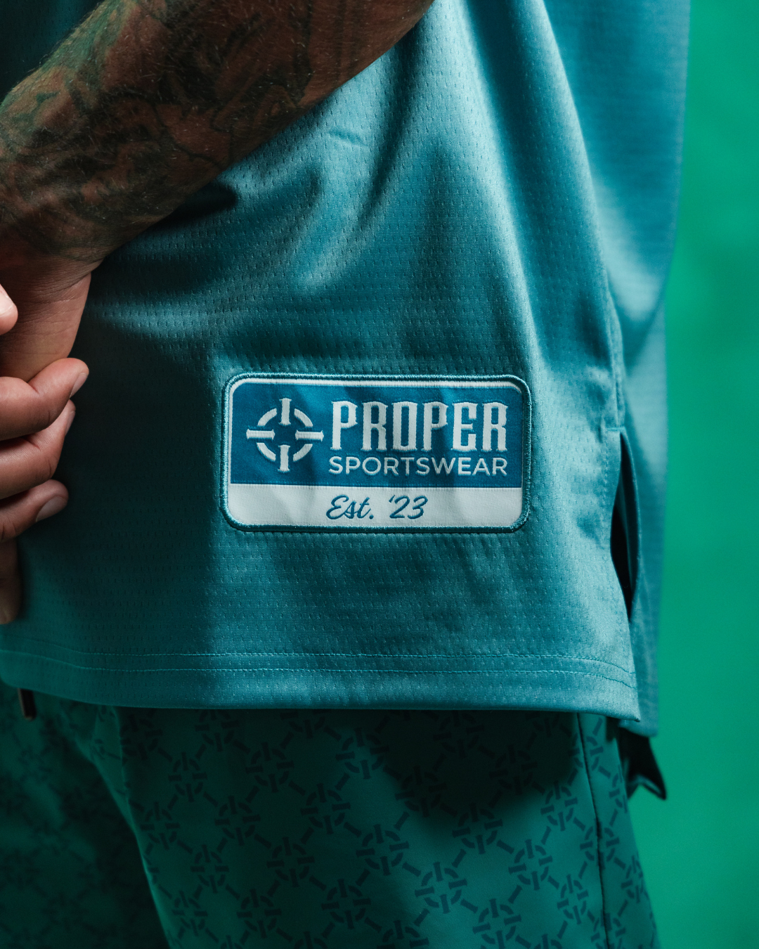PROPER OFFSET BASKETBALL JERSEY CYAN