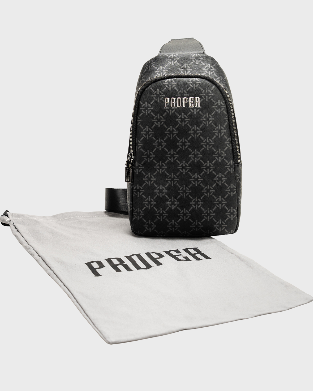 PROPER MONOGRAM SLING BAG BLACK